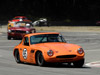 thumbnail image of an orange race care in a S turn section of the race track