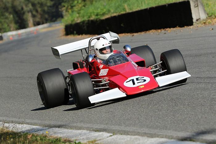 Collin Jackson racing the #75 Brabham BT40 red heritage racecar