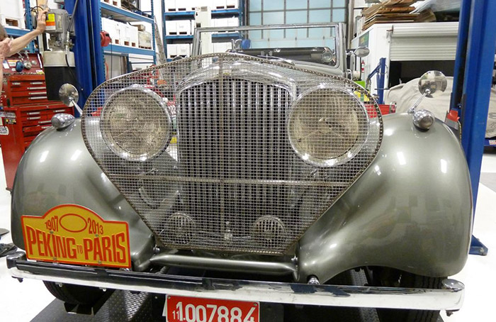 peking to paris bentley closeup of the grill and front of car